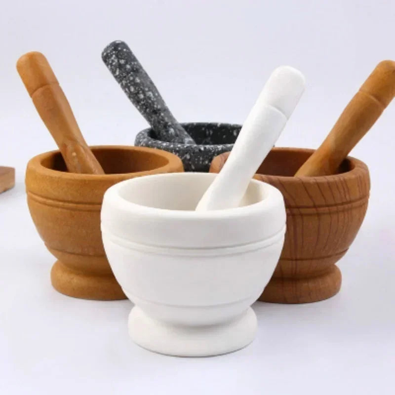 Les coloris du mortier et pilon PILOMIX : blanc, bois clair, bois foncé et granit